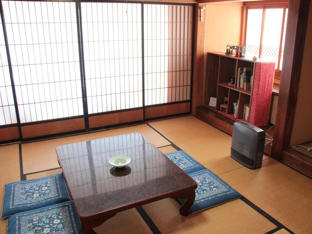 Hôtel Kyuhonbo Hisayamakan à Nagano Extérieur photo